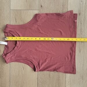 Lululemon TRAIN TO BE TANK. Relaxed fit, hip length. Size 2.